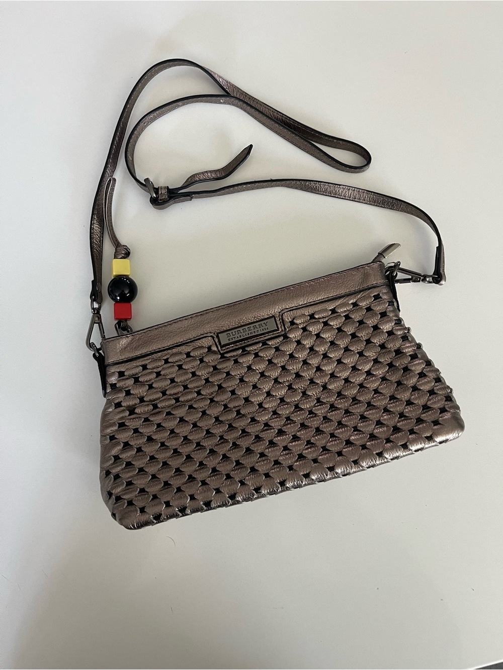 Burberry Metallic Bronze Woven Leather Crossbody with Bead Charm
